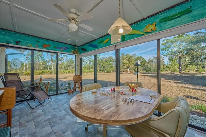 FOUR SEASONS ROOM WITH SLIDING DOORS ON ALL THREE SIDES