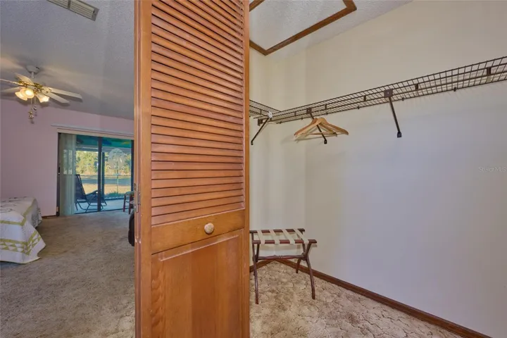 PRIMARY BEDROOM WALK-IN CLOSET