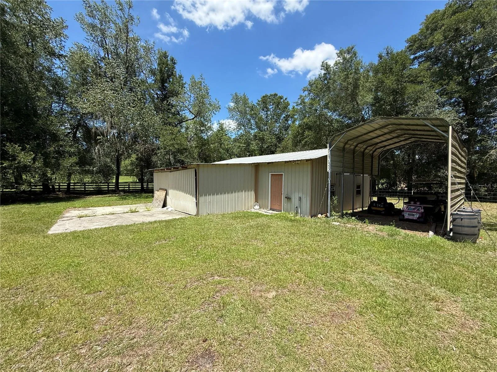 Storage Building and RV Carport