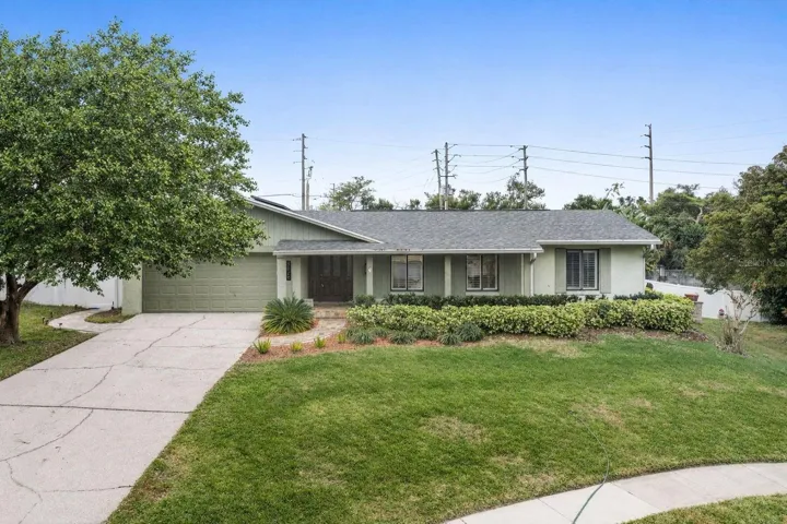 Welcome home to Sand Lake Hills ... where privacy, comfort, and timeless Florida living come together. Elevated living in the heart of Dr. Phillips ... 8626 Edge O Woods Ct welcomes you home.