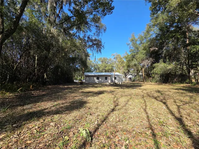 Backyard facing toward house