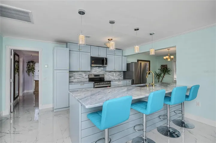 Large marble tile throughout