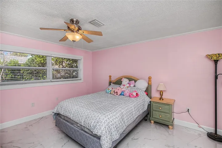 Guest bedroom with walk-in closet