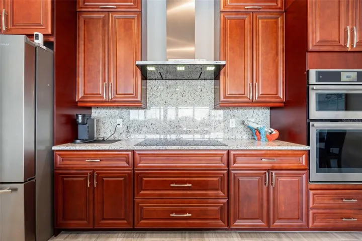 Note the granite backsplash