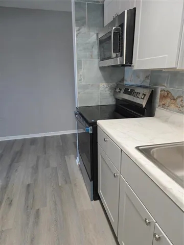 All new appliances, cabinets, and backsplash.