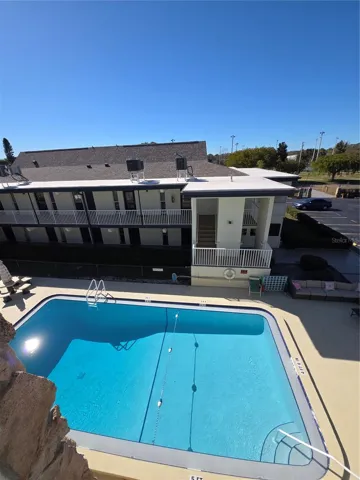 View of pool from upper floor
