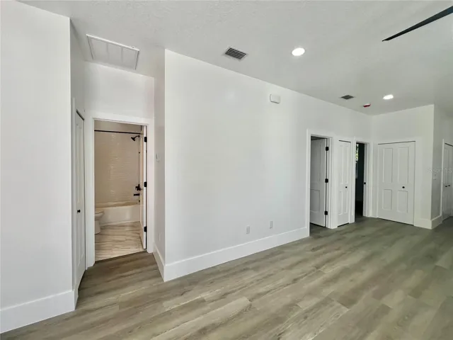 View of the Second/Guest Bathroom and two of the Bedroom from the Main entrance