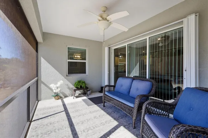 LANAI SHOWING ACCORDION SHUTTERS ON SLIDERS
