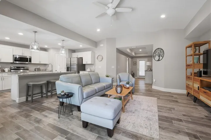 OPEN LAYOUT SHOWING GREAT ROOM, KITCHEN AND ENTRY FOYER WHERE GUEST ROOMS ARE ON LEFT (RIGHT FROM ENTRY)
