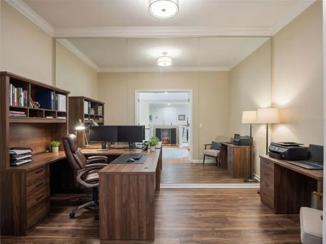 Upstairs flex room virtually staged as an Office.