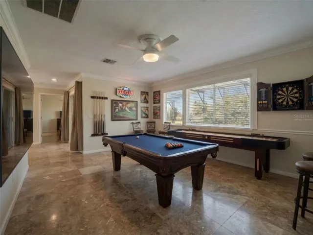 Upstairs Living space virtually staged as a game room.