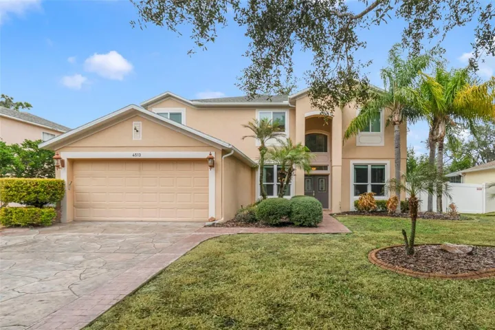 Tucked away on a QUIET CUL-DE-SAC in the well-maintained Georgia Cove community, this spacious 4-bedroom, 3-bath home offers NEARLY 2,800 SQUARE FEET of beautifully designed living space on almost a QUARTER-ACRE LOT.