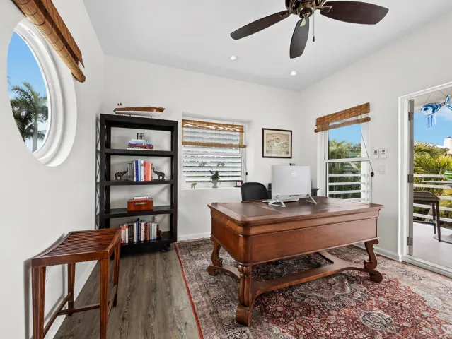 The 2nd bedroom on the 2nd level (currently being used as an office) also has doors out to the balcony
