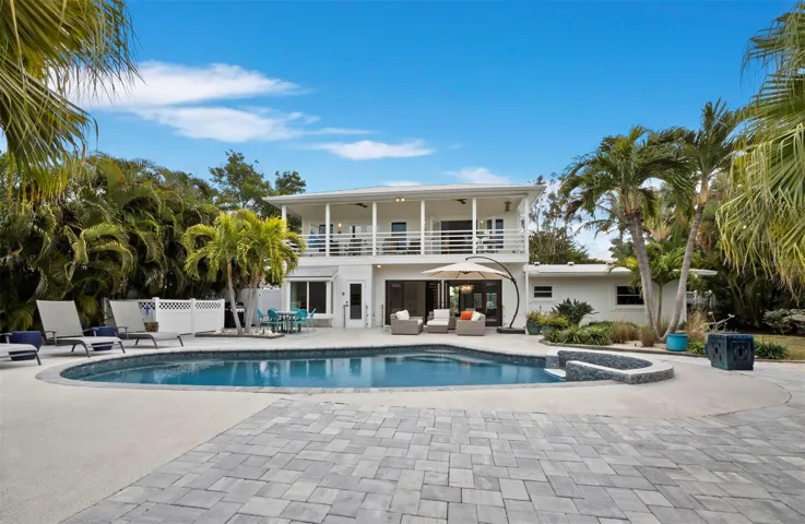 This fabulous waterfront home is like living in your own private resort