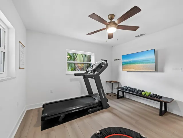 The 2nd first level bedroom is currently being used for workouts