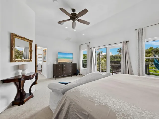 Stunning views to the backyard oasis and the canal beyond