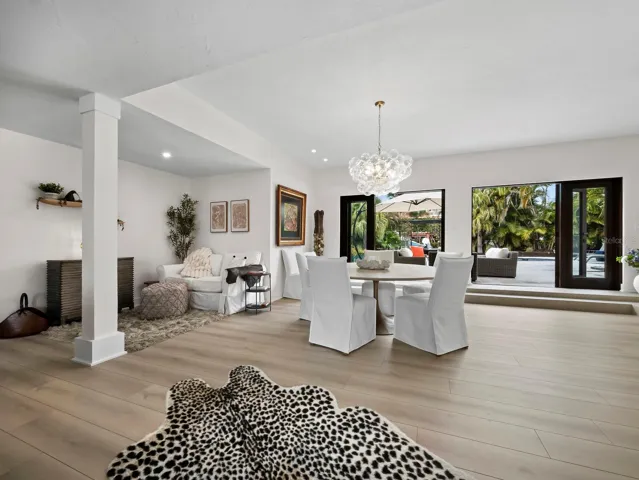 When you step inside this designer decorated home you see straight through to the gorgeous, resort-like backyard