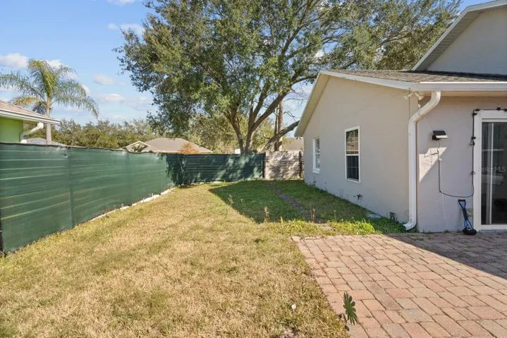 Rear View - open patio and all fenced backyard. Excellent for entertaining your guests.