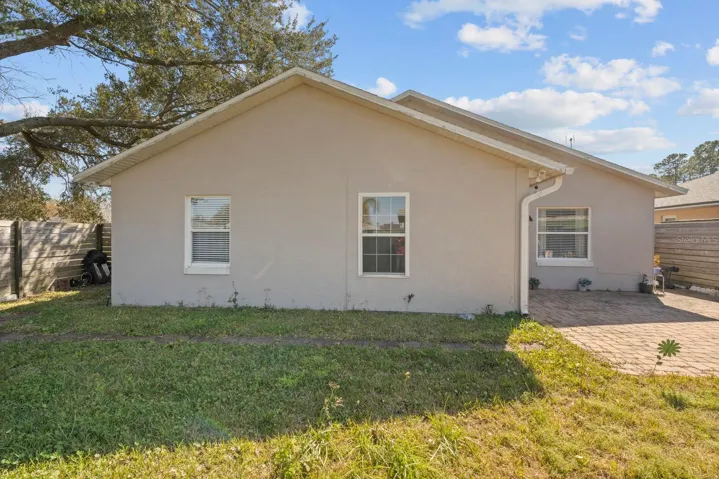 Rear View - open patio and all fenced backyard. Excellent for entertaining your guests.