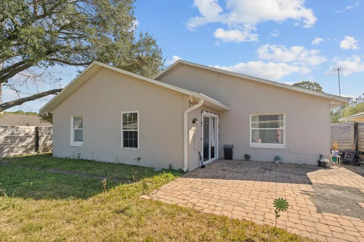Rear View - open patio and all fenced backyard. Excellent for entertaining your guests.