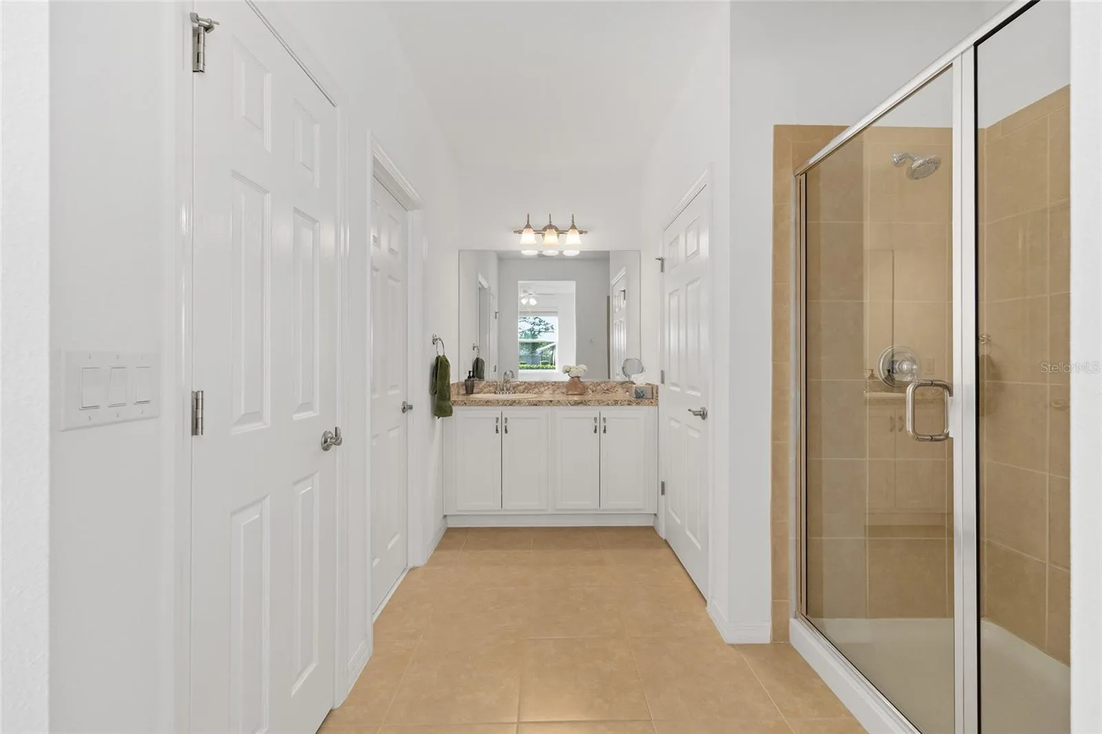 Ensuite Bathroom has Shower, Water closet, Linen cabinet and walk in Closet