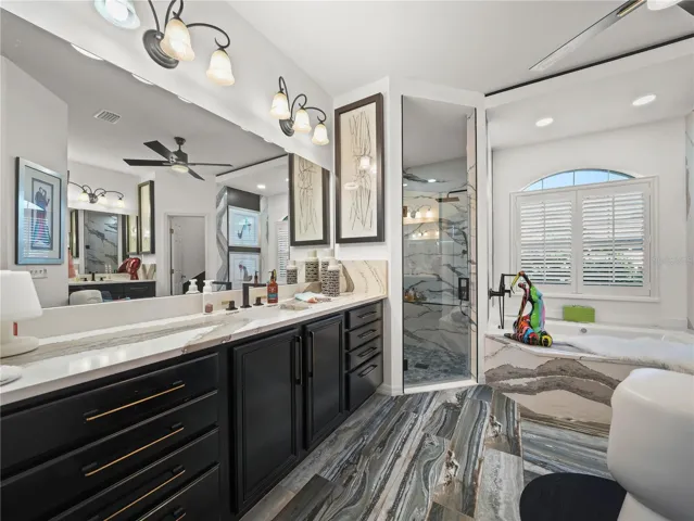 Primary Suite with Quartz Counter Top, Tile Plank Flooring