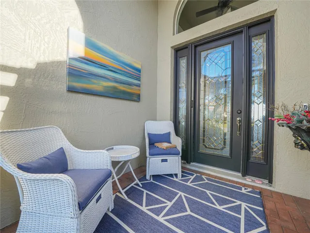 Sitting Area at the Front Door with Beveled Glass and Sidelights
