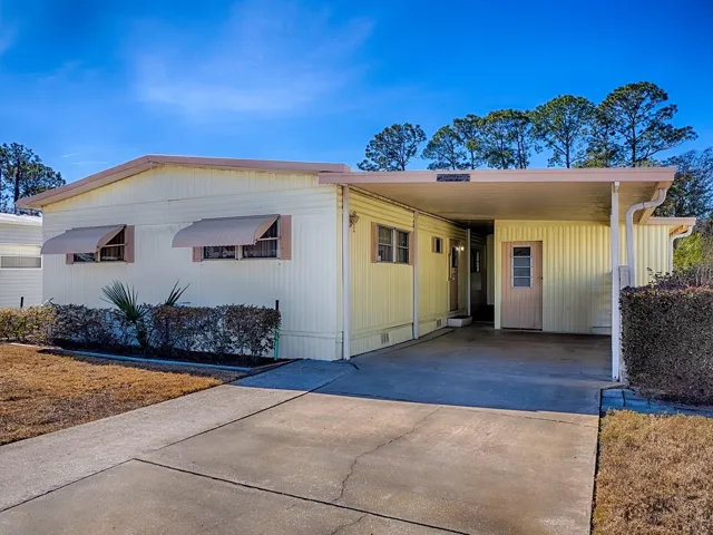 Front view 2 Bed 1.5 Bath, Carport, Large Storage Room w/Washer,Dryer