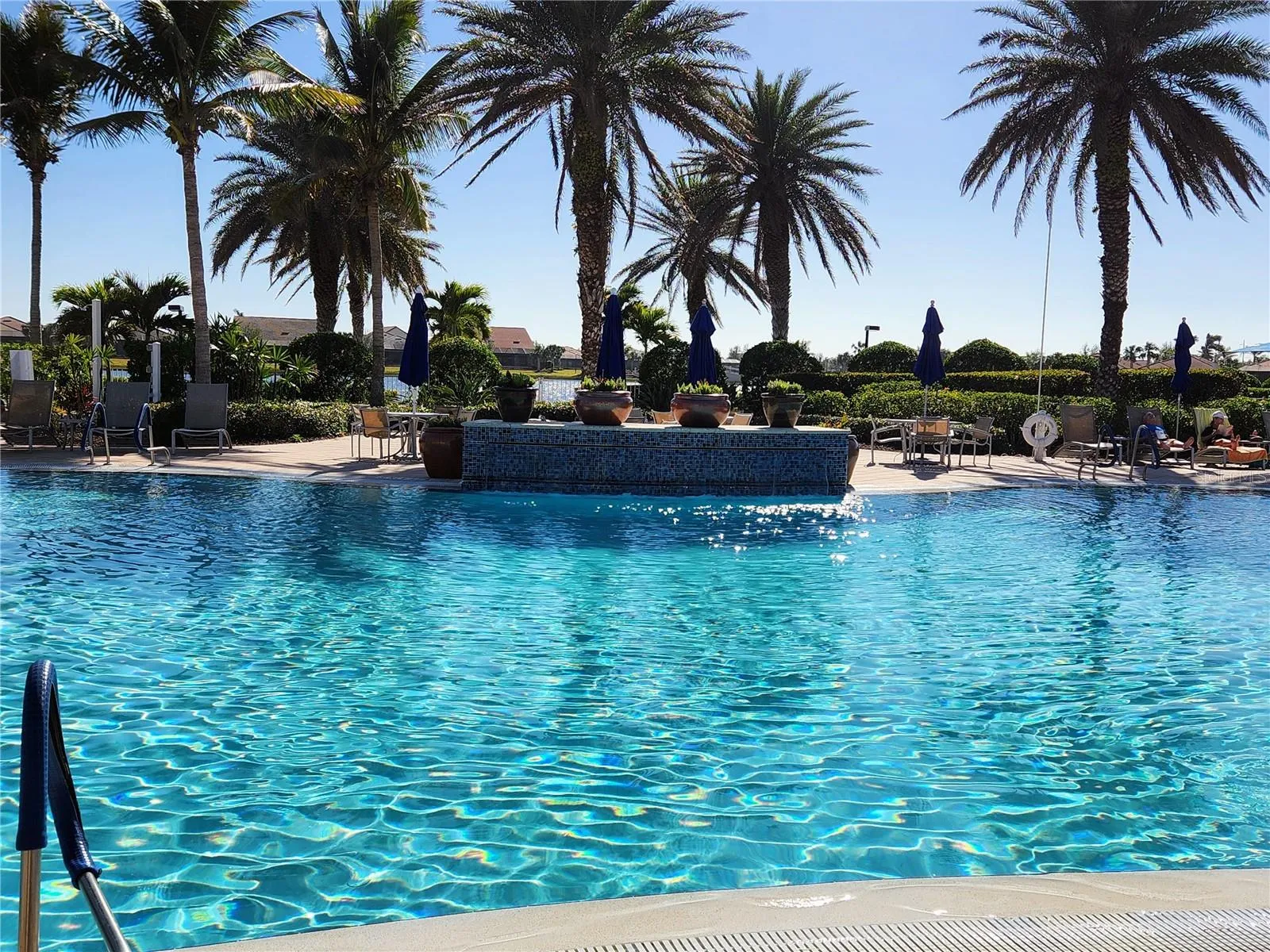 Take you golf cart to the community pool and relax in paradise.