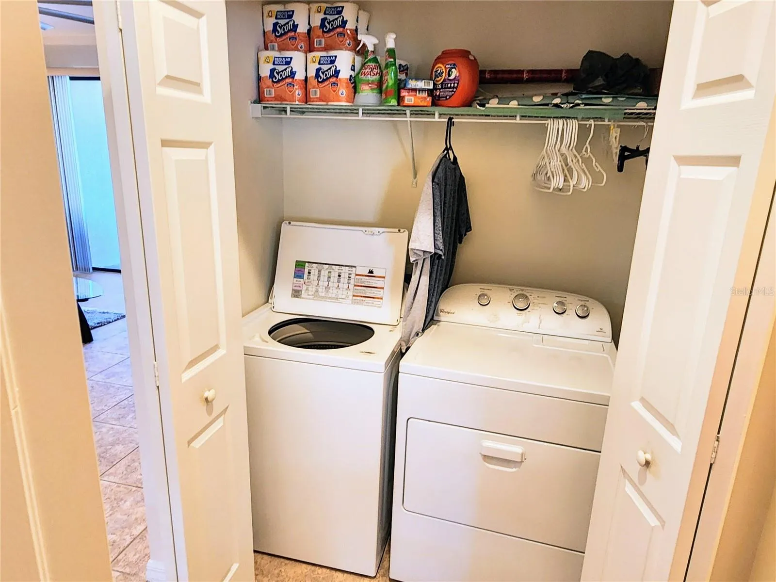 Laundry closet in hall