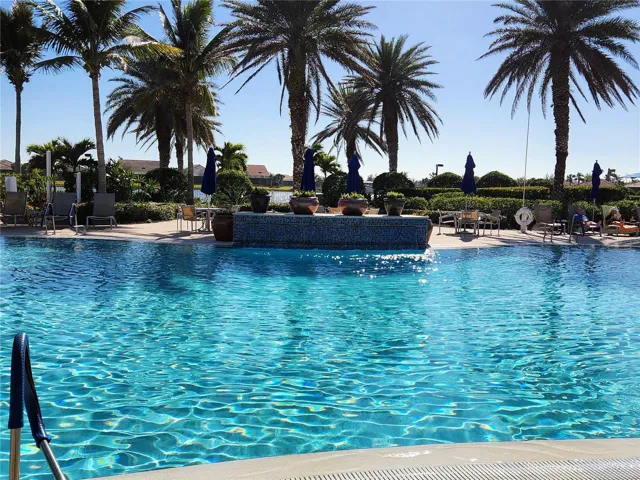 Take you golf cart to the community pool and relax in paradise.