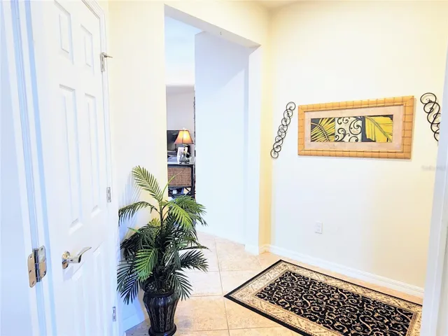 Entry way with closet outside the den