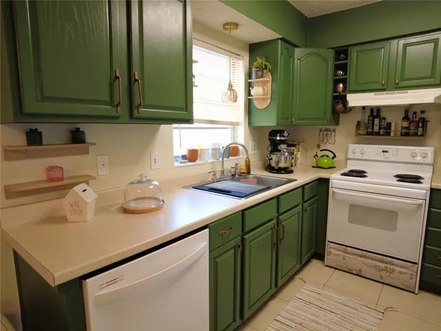 Spacious Kitchen with plenty of cabinets and counter tops.