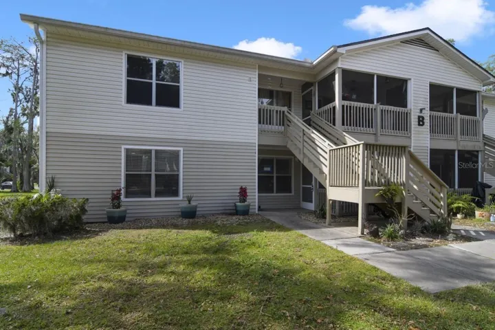 Convenient first floor condo unit just minutes from the beach with easy access to I-4 and I-95, fully RENOVATED KITCHEN & GUEST BATH, beautiful WOOD LOOK TILE FLOORS throughout and great AMENITIES!
