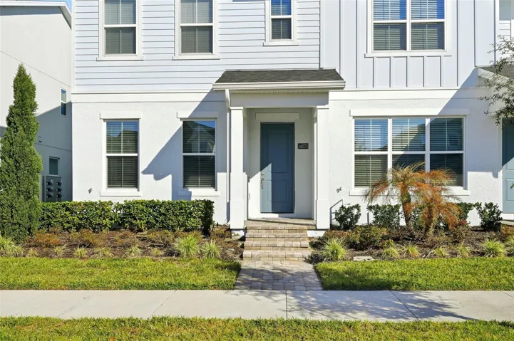 Front Entrance with Paver Bricks and Professional Landscaping