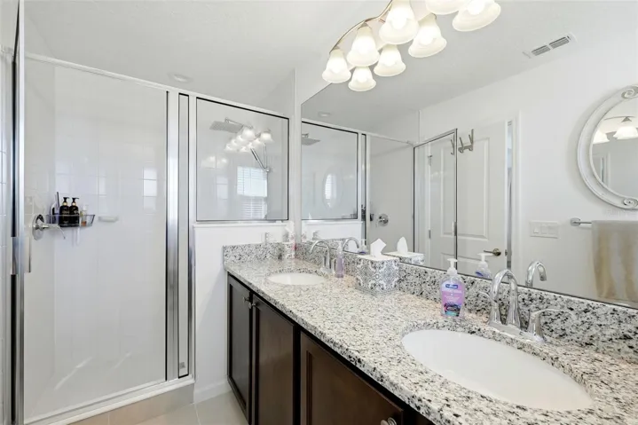 Primary Bedroom with Shower & Dual Vanities