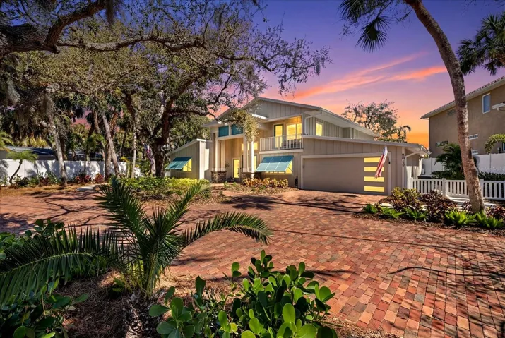 Located "On one of Siesta Key's most coveted canopied roads...sits a completely reimagined waterfront retreat."