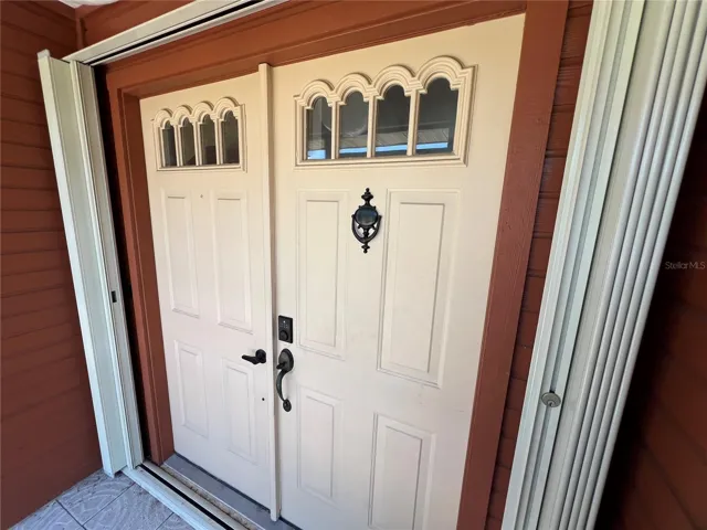 Accordion shutters on front door and all openings
