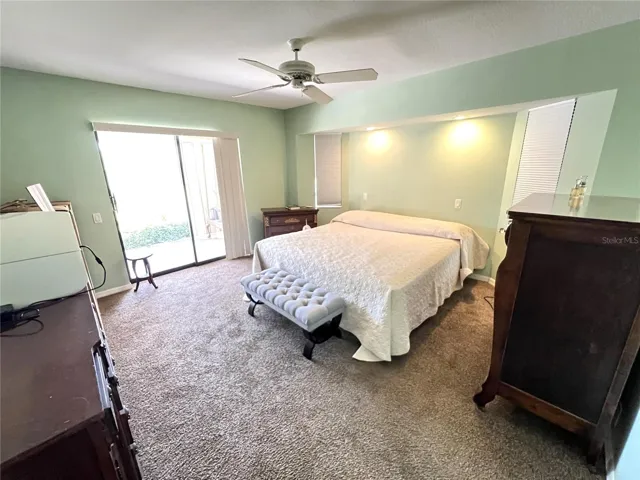 Primary bedroom with furniture