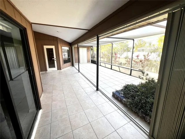 Screened lanai with garden area