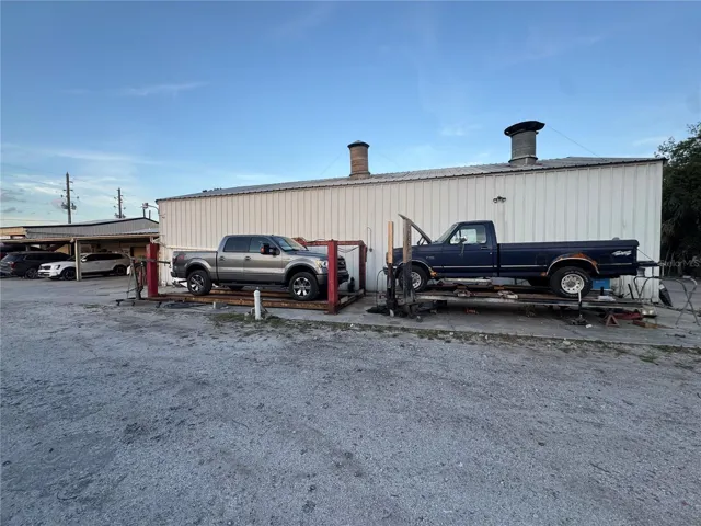 Rear Body Shop with 4-post lift and frame machine