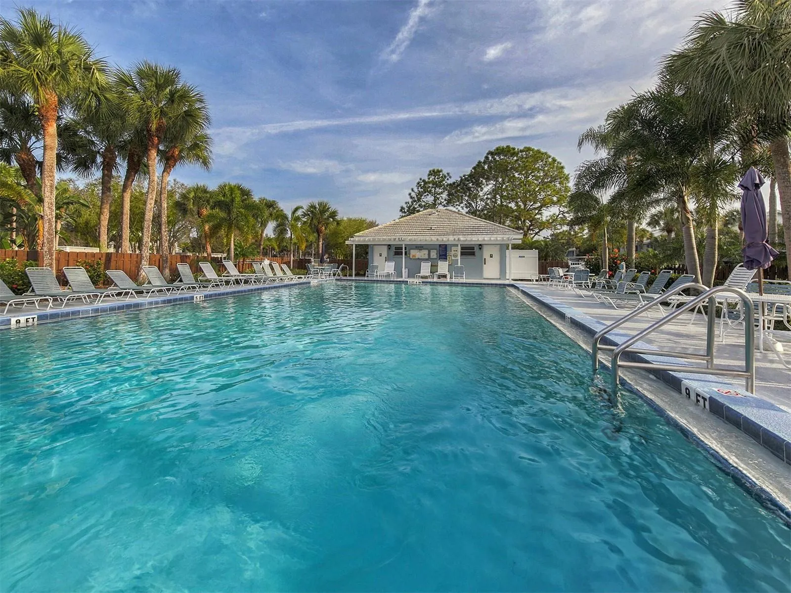The pool includes plenty of space for everyone to relax and soak up the Florida sunshine
