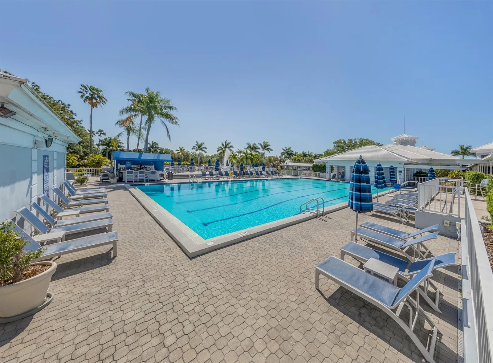 The Plantation Golf and Country Club pool is large, spacious, and offers water classes to be enjoyed by all