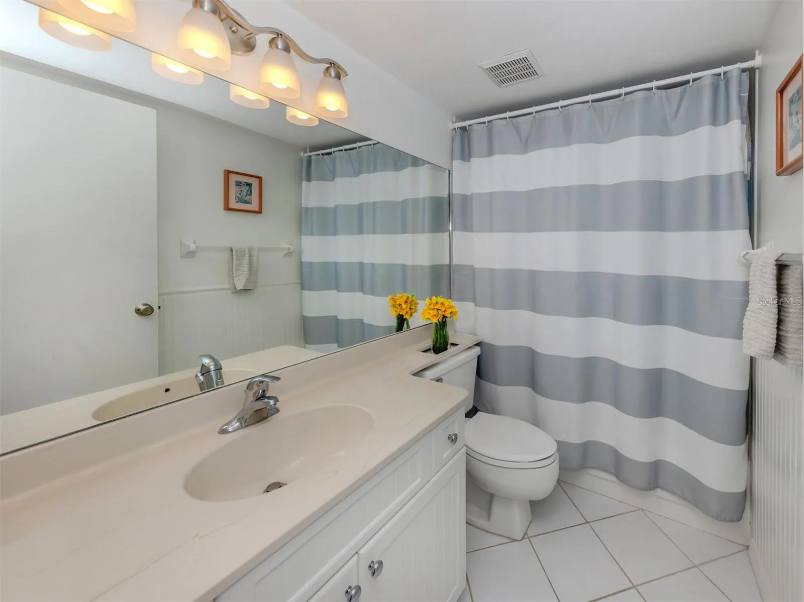 The second full bath is near the additional bedroom and great room making this convenient for guests