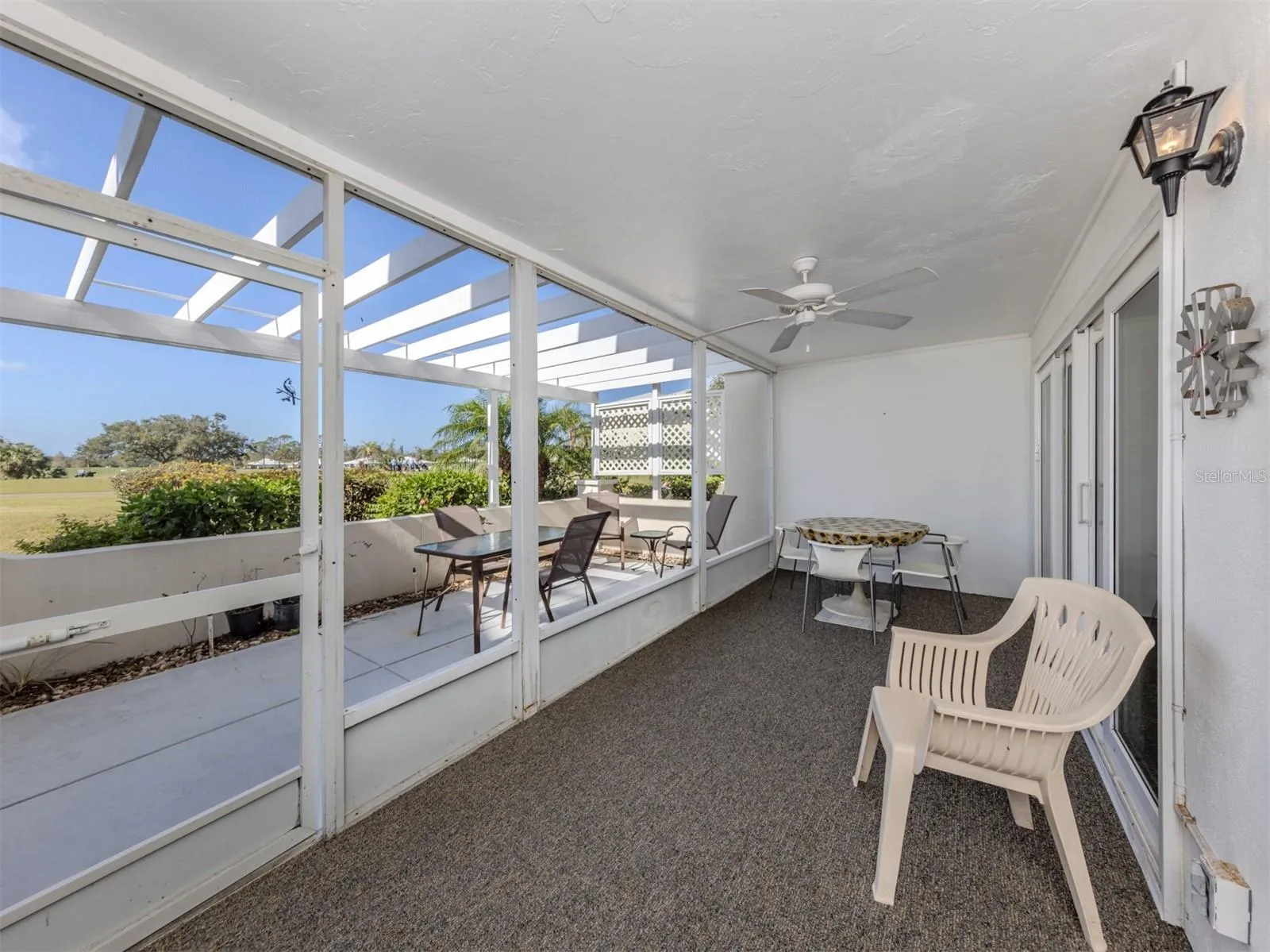 The screened lanai is large enough for an entertaining space and extra dining space