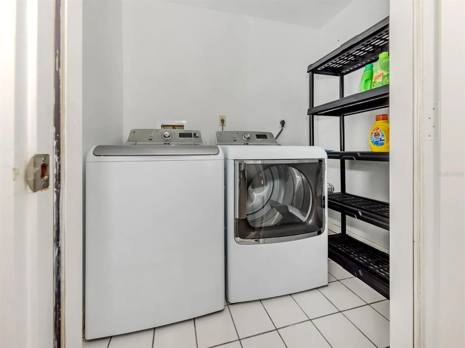 The laundry closet is located outside on the lanai in a private closet
