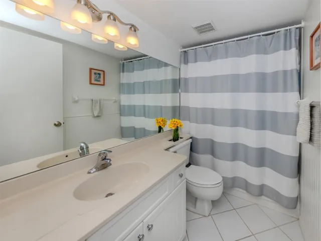 The second full bath is near the additional bedroom and great room making this convenient for guests