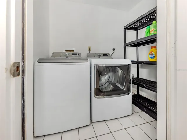 The laundry closet is located outside on the lanai in a private closet
