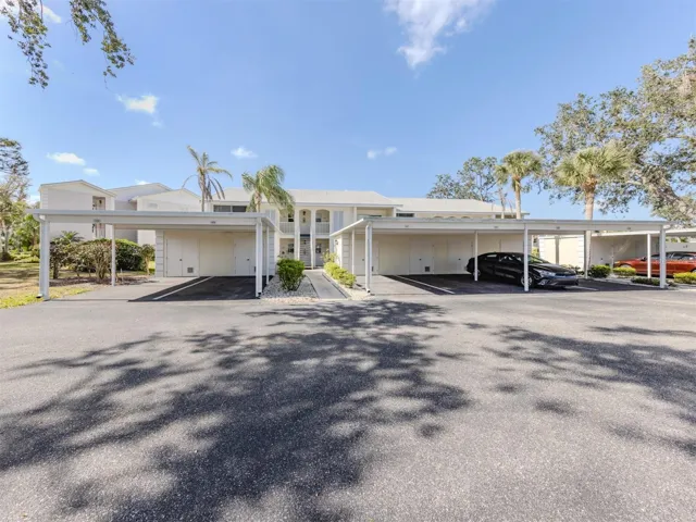 The spacious carport end unit completes this unit