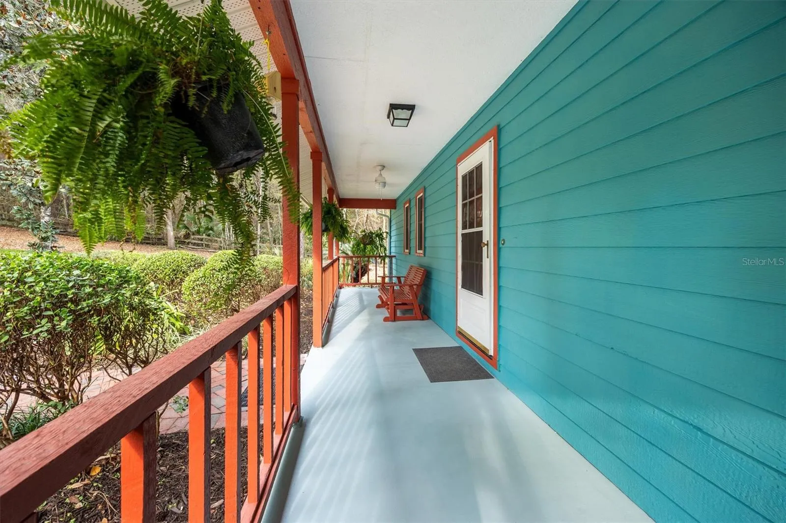 Front porch the entire length of the home
